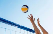 side-view-of-man-s-hands-preparing-to-hit-incoming-volleyball-over-the-net_23-2148662640
