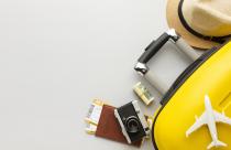flat-lay-yellow-luggage-with-copy-space (1)