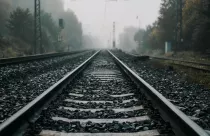 railroad-track-rails-coutry-landspace-autumn-weather-with-foggy-landscape-industrial-concept-railroad-travel-railway-tourism_527096-7604
