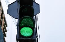 Traffic lights with glowing green