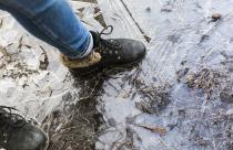 crop-legs-on-frozen-puddle