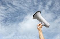 side-view-hand-holding-megaphone