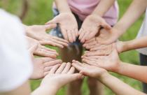 high-angle-friends-making-a-flower-with-their-hands