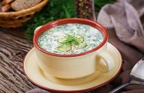 summer-yogurt-cold-soup-with-egg-cucumber-and-dill-on-wooden-table