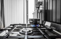 Small metal pan on the stove in the kitchen