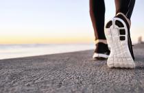 closeup-of-sport-shoes-on-concrete-path