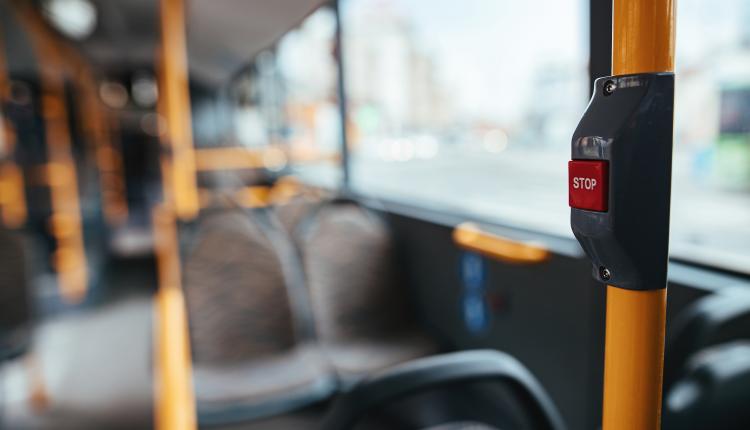 Close-up of handle in empty bus during global coronavirus epidem