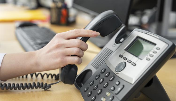 close-up-on-person-working-in-call-center