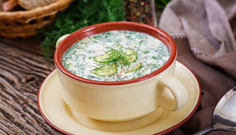 summer-yogurt-cold-soup-with-egg-cucumber-and-dill-on-wooden-table