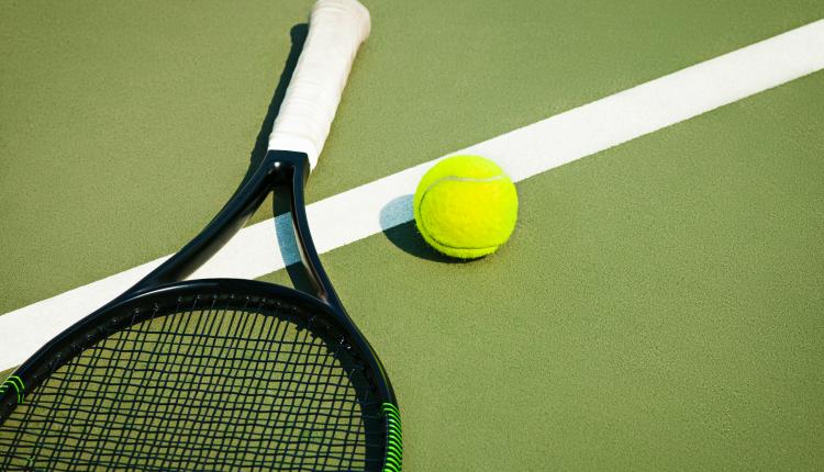 The tennis ball on a tennis court