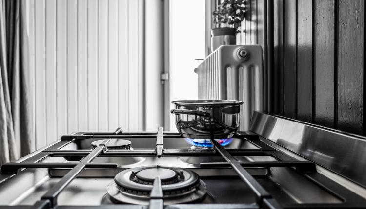 Small metal pan on the stove in the kitchen